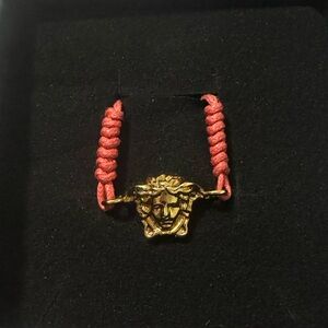Versace Gold Medusa Bracelet with Red Cord